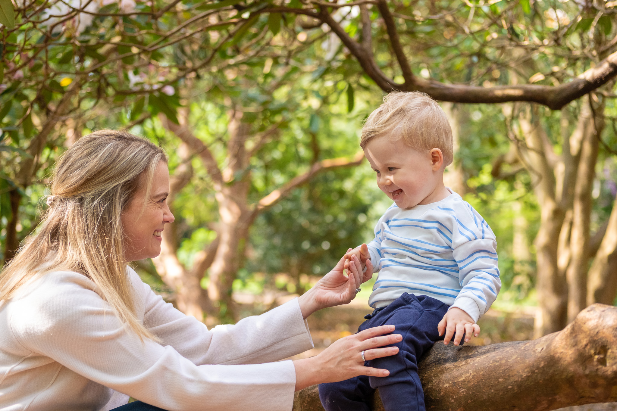 Mother and her boy looking at each other in a park